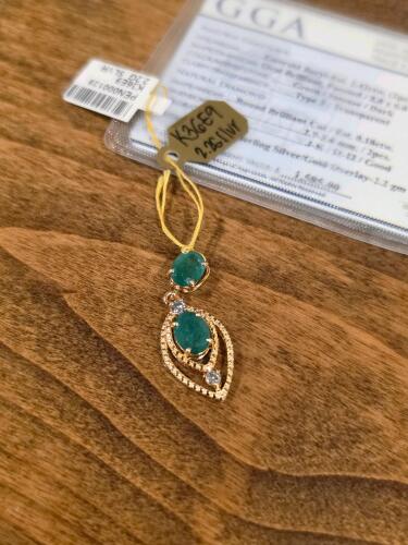 emerald and diamond pendant
