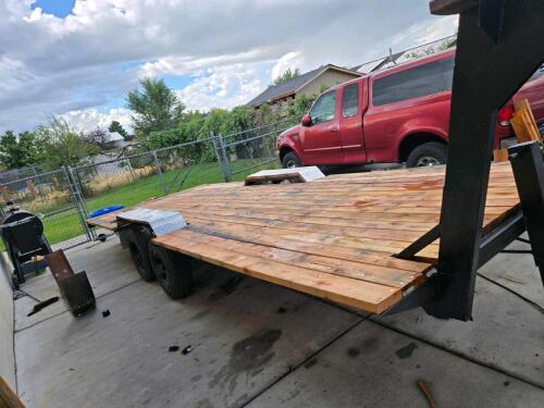 2000 26' Gooseneck Equipment Trailer | Features and notes: brand new wood decking and working lights. Dimensions: 26', main deck: 21x8, upper/gooseneck deck 6.5'x6.5' | Located offsite in Clearfield, UT. Buyer is responsible for pickup.