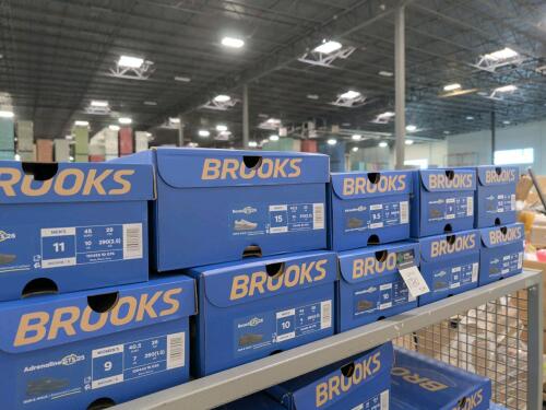 10 pairs of brooks shoes