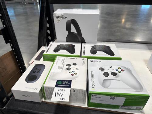 4 Xbox controllers Rokus station and headphones