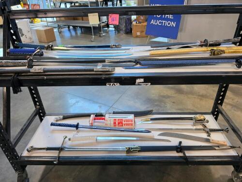 two shelves/ whole rack of swords and knives