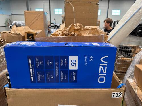 Vizio 4k 55" tv, cane, area rug, rolling garment rack by main stairs, and more