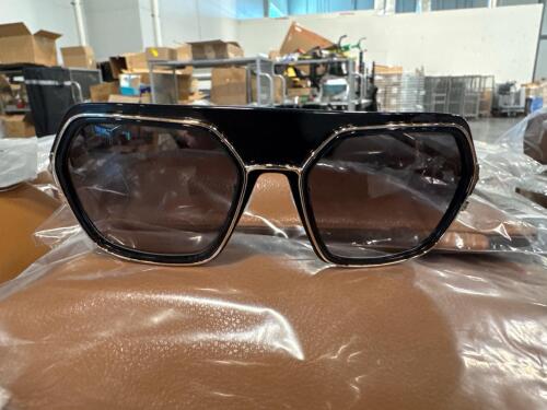 rolling rack of marcolin type sunglasses, we have reason to believe these are not authentic