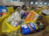 Big box in a box: Cracker jacks, knives, cups, garbage bags, propel, iced tea, biscuits, undergarments, towels, and much more