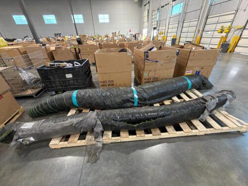 Two large rolls of turf, used