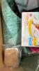 Cushions, ammo cans, pattern blocks, chair, unicorn and ride on, sleep number bedding, blanket, rug, water bottles, towels, napkins, & More - 10