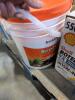 Boxes of miscellaneous goods including heavy duty diesel engine oil, driveway concentrate, insect spray, grass seed, & More - 9