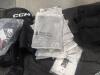 Some nicer clothing(approximately 153 total items, 44 pair of shoes, 46 clothing, 30 Adidas samples, 11 purses/bags, 12 vuori): vuori, Tory Burch, adidas, Justin, ariat, Tommy Bahama, Lacoste, timberland, boss, converse, adidas clothing, keen, sprayground - 6
