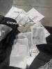 Some nicer clothing(approximately 153 total items, 44 pair of shoes, 46 clothing, 30 Adidas samples, 11 purses/bags, 12 vuori): vuori, Tory Burch, adidas, Justin, ariat, Tommy Bahama, Lacoste, timberland, boss, converse, adidas clothing, keen, sprayground - 7