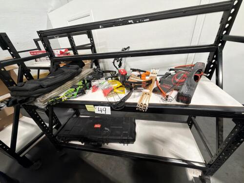 two shelves of archery equipment