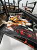 two shelves of archery equipment - 8