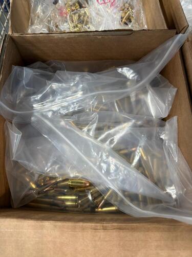 shelf of boxes full of miscellaneous ammo