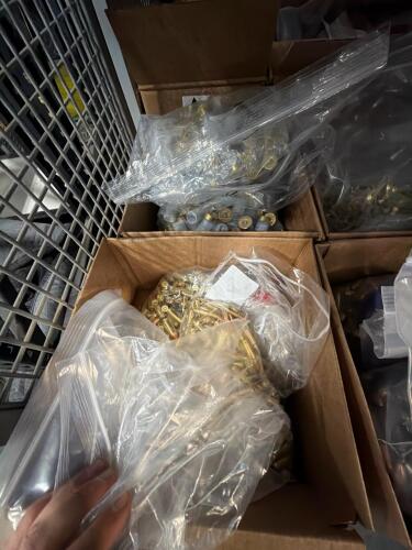 shelf of boxes full of miscellaneous ammo