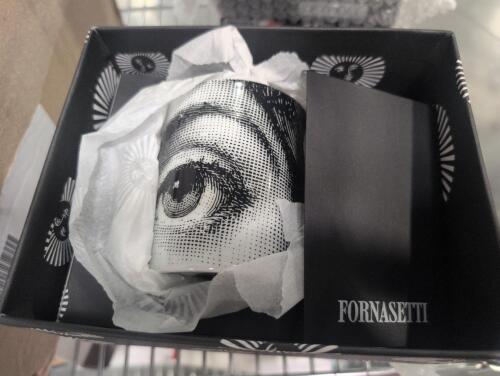 Fornasetti ashtrays and mugs