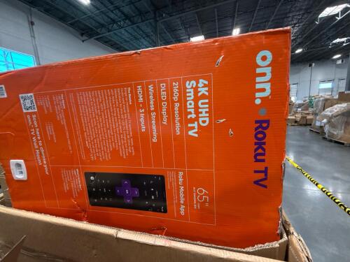 two TVs, one Roku one Samsung, two travel bags and more