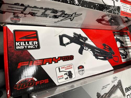 shelf of crossbows, cases, both, archery products