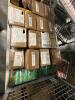 shelf of reloading, brass, canisters, and more - 2