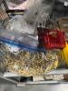 shelf of reloading, brass, canisters, and more - 4