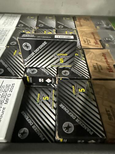 shelf of miscellaneous 12 gauge, buckshot, and others