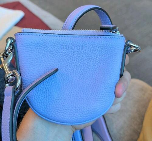 authentic Gucci B Nano leather bag featuring an embossed logo and grainy texture