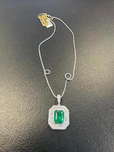 Platinum emerald and diamond pendant, 10.2 carats emerald, 3.5 carat diamond