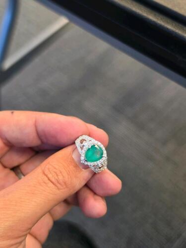 Columbian emerald and diamond ring in Platinum