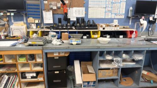 Shipping station contents , zebra scanners, computer monitors, multiple scales, filing cabinet, totes, labels, fans, desk/tables