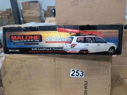Kayak roof holders , towels, miscellaneous furniture, guitar pieces, small wheels, Ford mudflaps, motor/engine