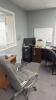 Main office room with contents including unlimited to tasks, computer, multiple printers, filing cabinet cabinets, LEXMARK XM 7163 printer, Shredder, Epson printer, multiple filing cabinets, utility cart, & More - 14