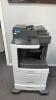 Main office room with contents including unlimited to tasks, computer, multiple printers, filing cabinet cabinets, LEXMARK XM 7163 printer, Shredder, Epson printer, multiple filing cabinets, utility cart, & More - 16