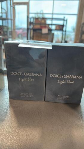 Two dolce & gabbana light blue, one is open box box