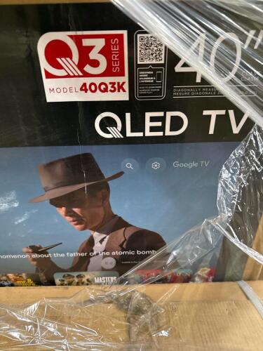 TCL 40 inch TV, miscellaneous furniture, possible storage boxes, and more