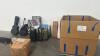 Luggage, box of Beatrice ball bowls, gladiator gear rack golf, hot wheels track, Zumiez skateboard, pool stick, golf bag, Johnson guitar, guitar case