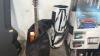 Luggage, box of Beatrice ball bowls, gladiator gear rack golf, hot wheels track, Zumiez skateboard, pool stick, golf bag, Johnson guitar, guitar case - 4