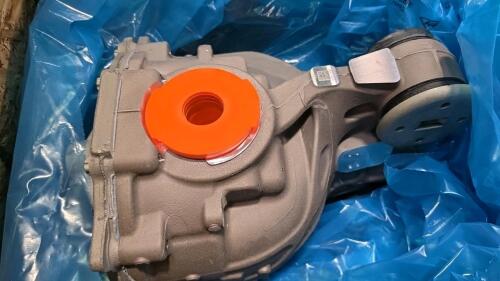 Automotive parts most likely transfer cases, Ford wheels TC 3Z &ndash; 1007 &ndash; B, headlamp SZ6Z &ndash; 13008