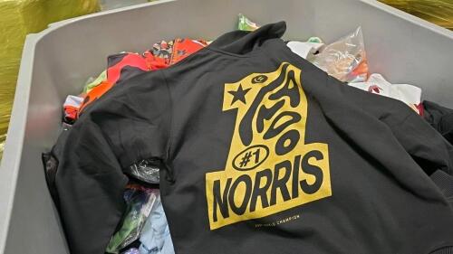 clothing, some Adidas jerseys, boutique clothing, Walmart bras, tie-dye t-shirts, stacks of 100% cotton black t-shirts, Norri Norris brand, altered state, Calvin klein, and much more