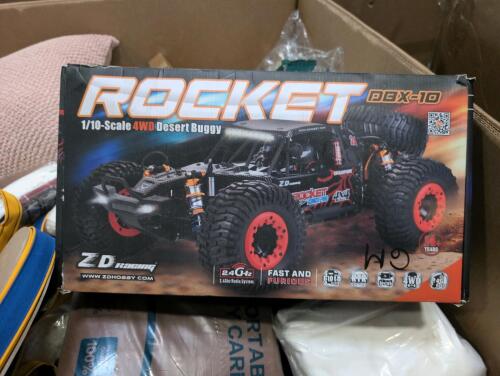 rocket DBX-10 4wd desert buggy, twin duvet covers, golf bag. hood, sensitive care pads, miscellaneous books