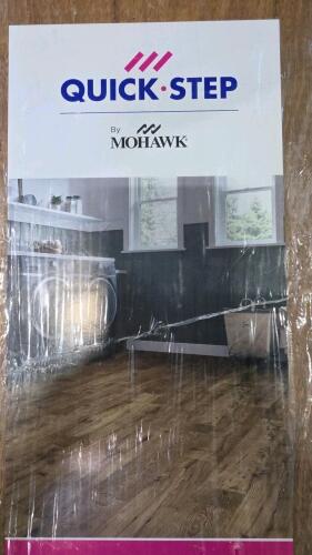 pallet of quick step by Mohawk laminate wood flooring, in Longview Chestnut