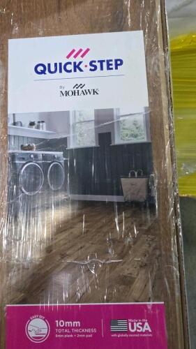 pallet of quick step by Mohawk laminate wood planks, 10 mm, in Longview Chestnut
