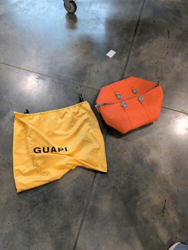 orange GUAPI monogram duffle bag (has not been authenticated)