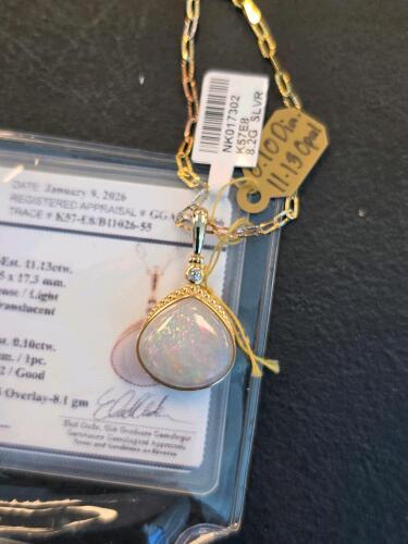 opal and diamond pendant and sterling silver