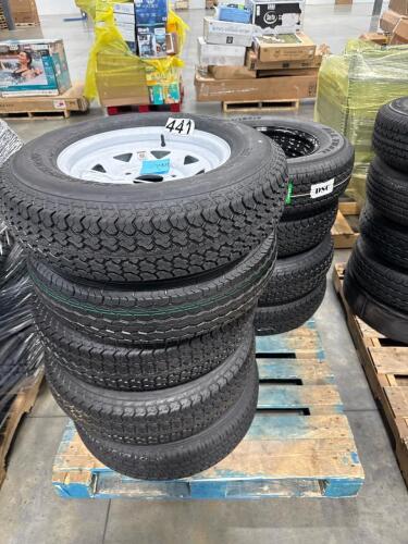 Nine tires with rims