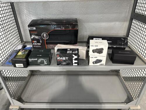 shelf of misc scopes and range finder's