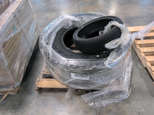 Large semi tire and one smaller tire