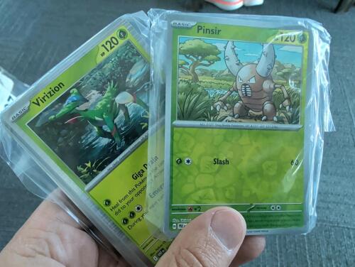 50 Pokemon holo/reverse holo's