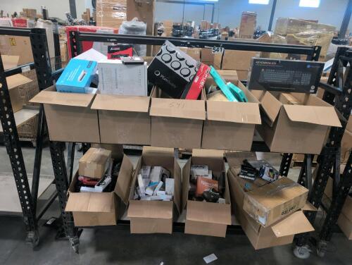 Electronics: charging cables, Milwaukee pack out piece, wall scanner, laser pointers multiple, synco microphone, screen extender, solar tower feeder kit, JBL speaker, Milwaukee saws all, plum buddy, sound bar, 3-D print filament, original super Mario Brot