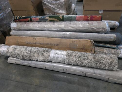 Pallet of rugs, mattress