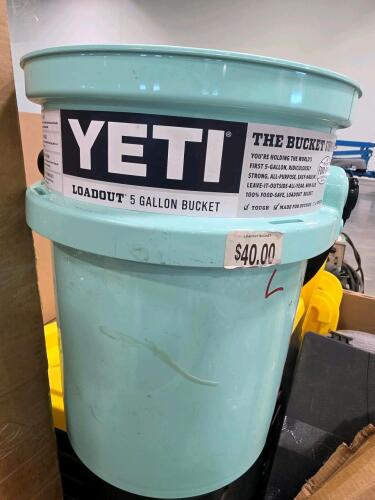 plastic totes, rolled mattress, yeti load out 5 gallon bucket, rug,
