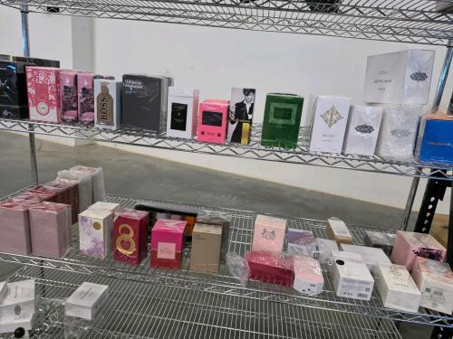 two shelves of perfume and cologne, we have not authenticated any of these, some we believe to be authentic some maybe not so please take this for what it is worth.