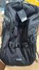 Pillows, multiple blankets, kids ride on toy, shoes, tape, backpacks, metal containers - 5